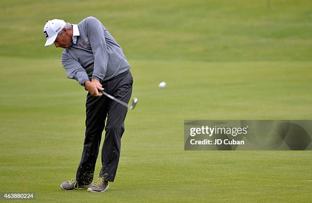 Fred Couples takes his second shot on the 13th hole during round one of the Northern Trust Open at Riviera Country Club on February 19, 2015 in...