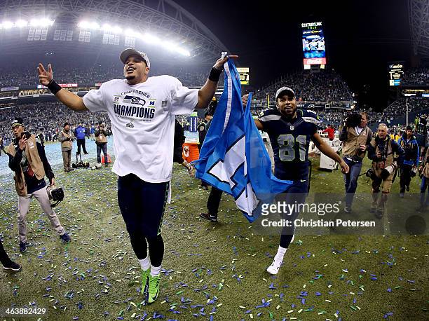 Wide receiver Jermaine Kearse and wide receiver Golden Tate of the Seattle Seahawks celebrate after the Seahawks 23-17 victory against the San...