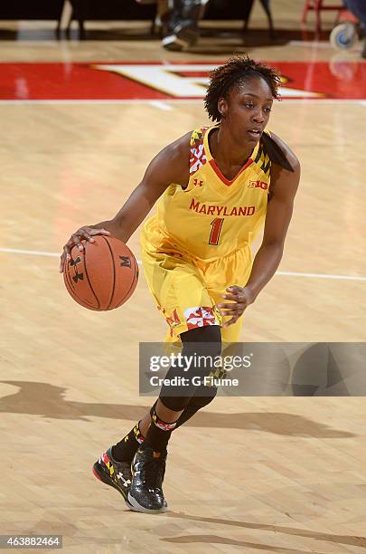 Laurin Mincy of the Maryland Terrapins handles the ball against the Rutgers Scarlet Knights at the Xfinity Center on February 10, 2015 in College...