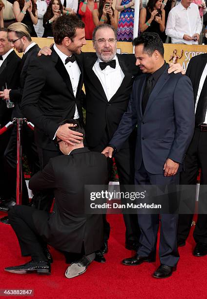 Bradley Cooper, Michael Pena and Vitalii Sediuk arrive at the 20th Annual Screen Actors Guild Awards at the Shrine Auditorium on January 18, 2014 in...