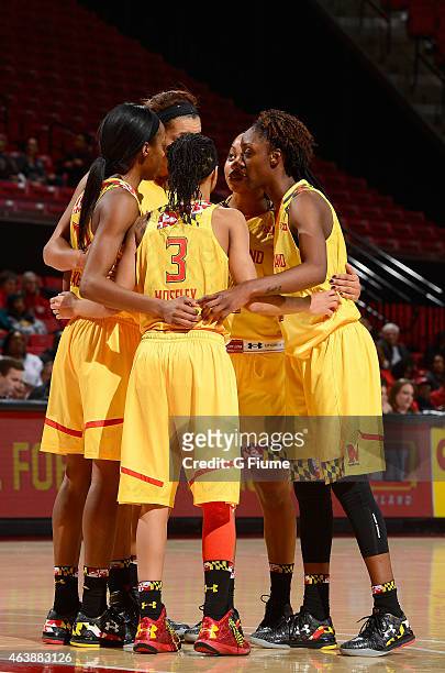 The Maryland Terrapins huddle up during the game against the Rutgers Scarlet Knights at the Xfinity Center on February 10, 2015 in College Park,...