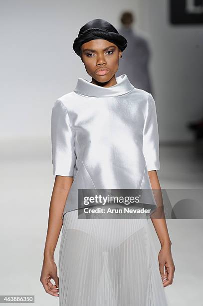 Model walks the runway in a design by Esosa at the New York Life fashion show during Mercedes-Benz Fashion Week Fall 2015 at The Salon at Lincoln...