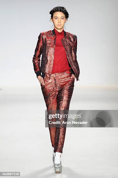 Model walks the runway in a design by Esosa at the New York Life fashion show during Mercedes-Benz Fashion Week Fall 2015 at The Salon at Lincoln...