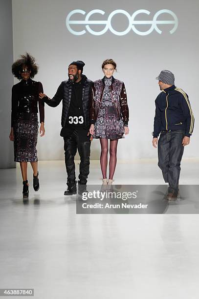 Designer Emilio Sosa walks the runway with models in designs by Esosa at the New York Life fashion show during Mercedes-Benz Fashion Week Fall 2015...