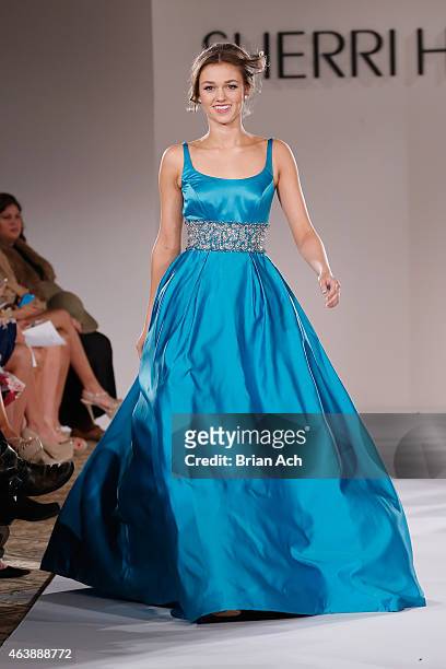 Sadie Robertson walks the runway at the Sherri Hill fashion show during Mercedes-Benz Fashion Week Fall 2015 at The Plaza on February 19, 2015 in New...