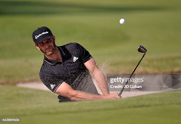 Dustin Johnson takes his second shot on the 10th hole during round one of the Northern Trust Open at Riviera Country Club on February 19, 2015 in...