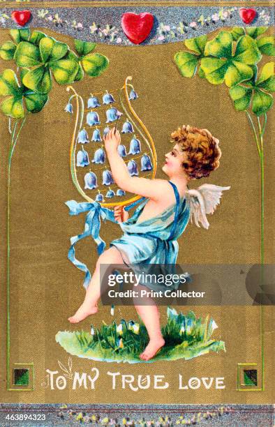 'To My True Love', American Valentine card, c1910. Cupid dances on grass with naturalised Snowdrops and is playing a lyre of bluebells. Above him are...