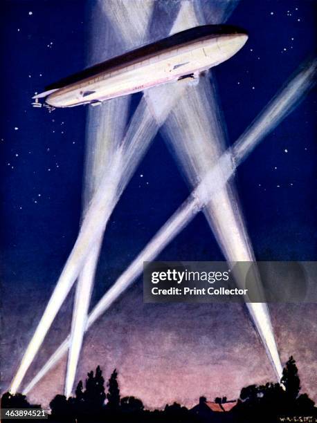 Zeppelin airship caught in searchlights during a bombing raid over England, 1916. On the night of 2-3 September London was bombed. Illustration...