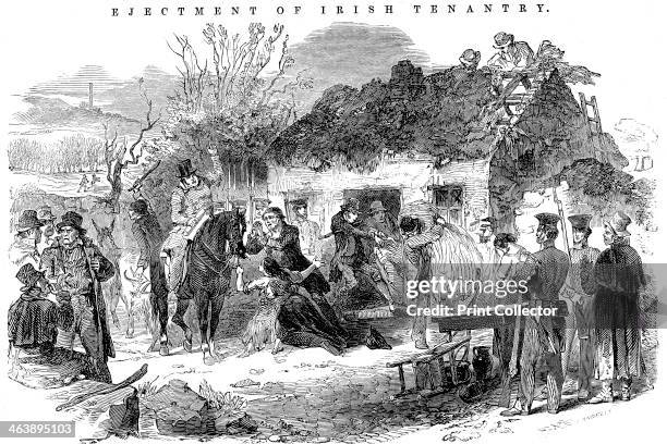 Evicted Irish peasant family, 1848. Irish peasant family unable to pay rent because of failure of potato crop due to blight, evicted from their...