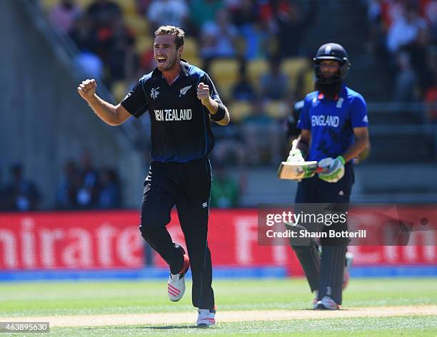 Tim Southee of New Zealand celebrates after taking the wicket of Ian Bell of England during the 2015 ICC Cricket World Cup match between England and...