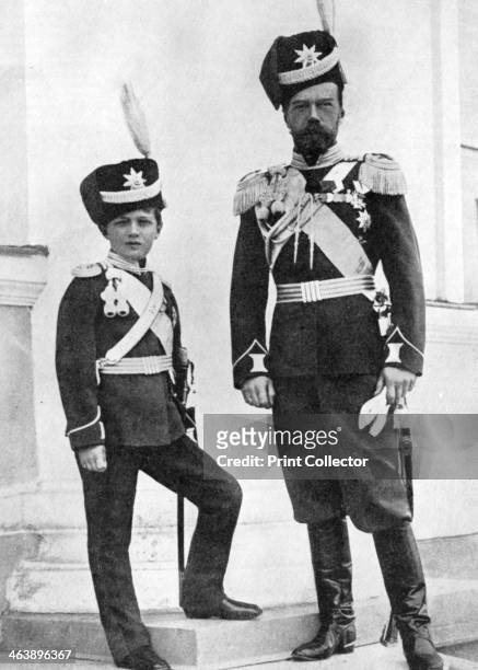 Tsar Nicholas II of Russia and his son, Alexei, in military uniform, c1910-c1916. Nicholas II , Emperor of Russia from 1894 and the Tsarevich Alexei...