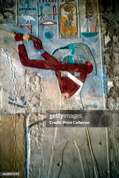 Wall painting depicting the Ancient Egyptian Ibis-headed god Thoth, temple of Rameses III, Medinet Habu, Egypt, c1187-c1156 BC. Thoth was secretary...