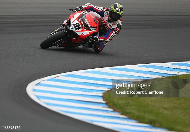 Troy Bayliss of Australia rides the Aruba.it Racing-Ductati Superbike Team Ducati Panigale R during the practice session for the World Superbikes...