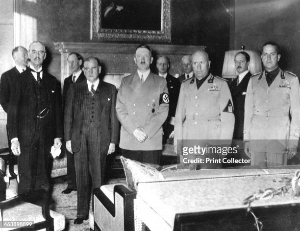 Leaders at the Munich Peace Conference, September 1938. Left to right: Neville Chamberlain Edouard Daladier Adolph Hitler Benito Mussolini and Count...