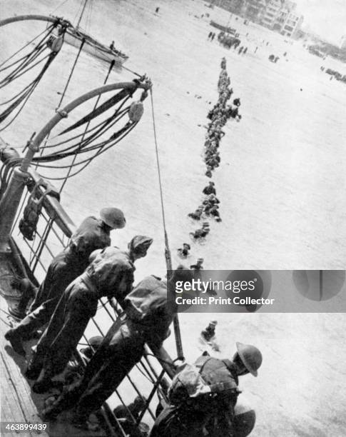 Evacuation of British troops from Dunkirk, 27 May - 3 June 1940. Troops wading out to find a place on rescue vessels, World War 2.