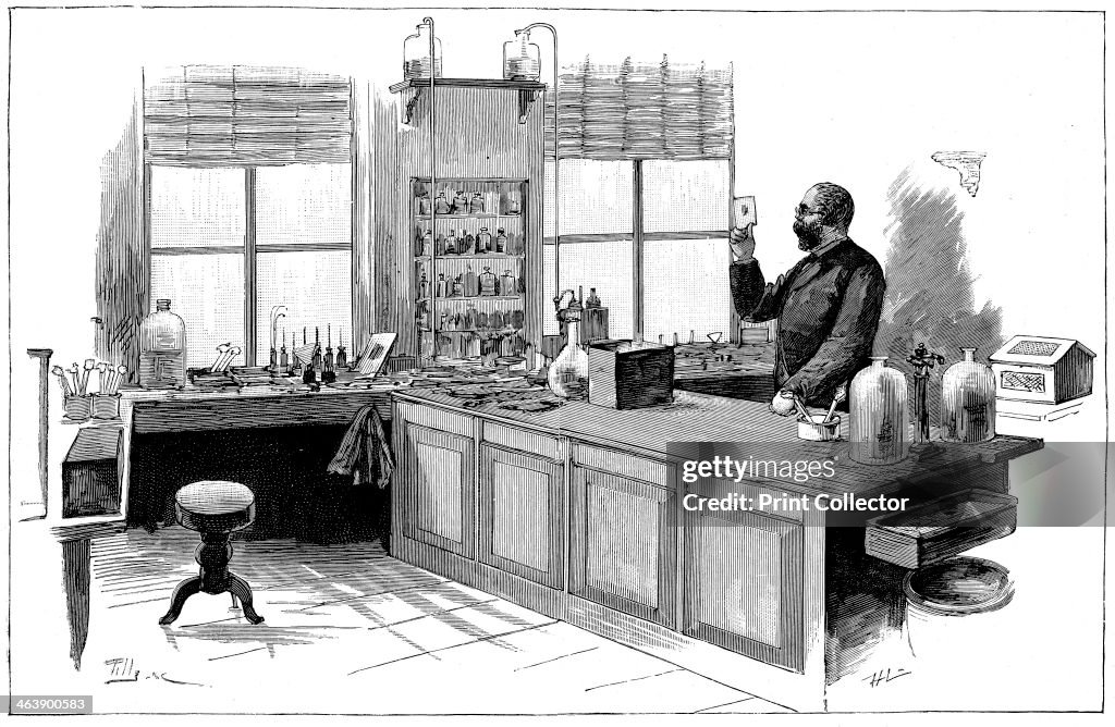 Robert Koch (1843-1910), German bacteriologist and physician in his laboratory.
