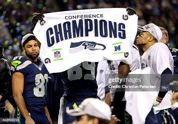 Wide receivers Golden Tate, wide receiver Doug Baldwin and Jermaine Kearse of the Seattle Seahawks celebrate after the Seahawks 23-17 victory against...