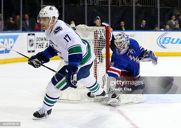 Radim Vrbata of the Vancouver Canucks scores the game winner as Cam Talbot of the New York Rangers looks on during the shootout on February 19, 2015...