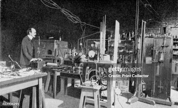 Thomson, British physicist, at work in the Cavendish Laboratory, Cambridge. Joseph John Thomson discovered the electron and was a pioneer of nuclear...