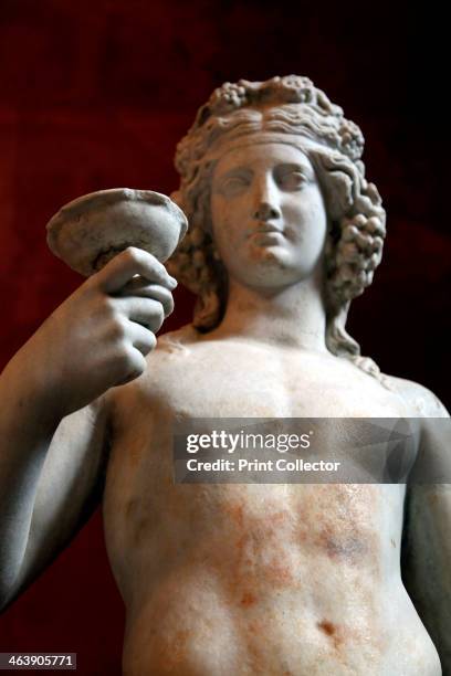 Statue of Dionysus, God of Wine and patron of wine making. Roman, after a Greek model of the 4th century BC. Found in the collection of The...