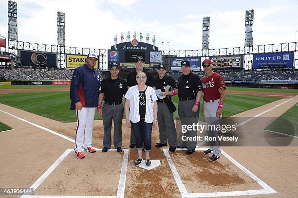 Breast cancer survivor and MLB Honorary Bat Girl Vanessa Parzatka delivers the lineup card prior to the Mothers Day game against the Arizona...