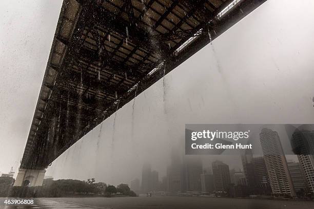 Rainwater flows off of the Story Bridge and into the Brisbane River on February 20, 2015 in Brisbane, Australia. Tropical Cyclone Marcia was graded a...