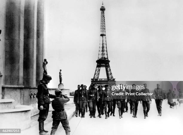 Members of the SS visiting the Eiffel Tower, Paris, July 1940.