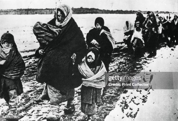 Homeless refugee women and children, Russia, 1941.