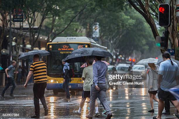Rain falls on the Brisbane central business district on February 20, 2015 in Brisbane, Australia. Tropical Cyclone Marcia was graded a Category 4...