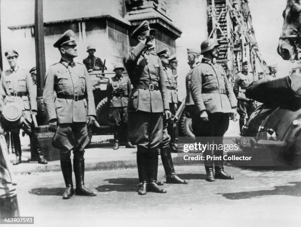 General von Bock saluting German troops parading past the Arc de Triomphe, Paris, on 14 June 1940, the day that the city fell to the Nazis.