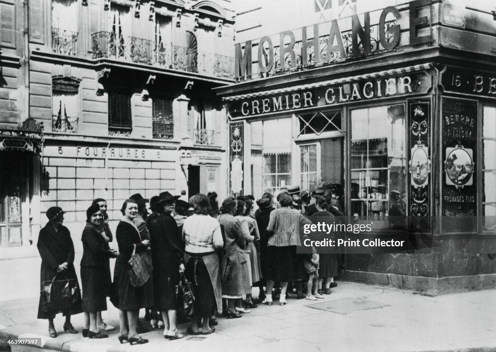 Queue of women outside a dairy shop, German-occupied Paris, 28 June 1940.