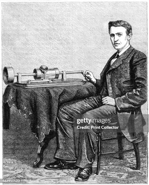 Thomas Alva Edison, American inventor, with an early hand-driven model of his phonograph, 1878. Edison was a prolific inventor who registered over...