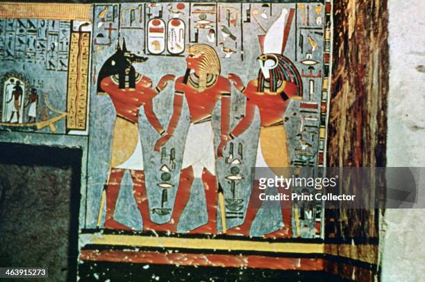 Mural from the Tombs of the Nobles, Thebes, Luxor, Egypt, 20th Century. The gods Anubis and Horus. The Tombs of the Nobles are tombs of priests and...