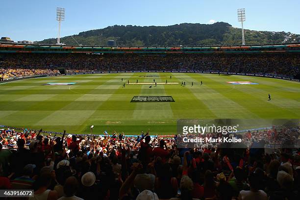 General view is seen of the ground as New Zealand celebrate taking the wicket of Gary Ballance of England during the 2015 ICC Cricket World Cup match...