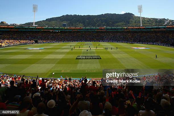 General view is seen of the ground as New Zealand celebrate taking the wicket of Gary Ballance of England during the 2015 ICC Cricket World Cup match...