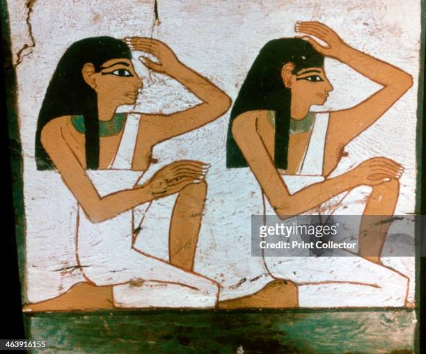'Two Mourners', detail of the decoration of a sarcophagus of The Lady of Madja, 18th Dynasty. Found in the collection of the Louvre, Paris.