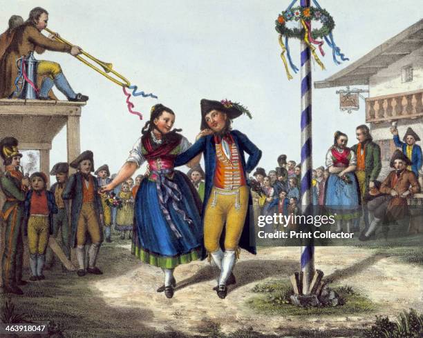 Popular festivities, mid 19th century. A young couple dance round a garlanded pole while a second couple wait outside the inn to take their turn.