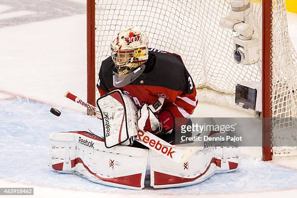 Goaltender Zachary Fucale of Canada makes a blocker save against Slovakia during the 2015 IIHF World Junior Championship on January 04, 2015 at the...