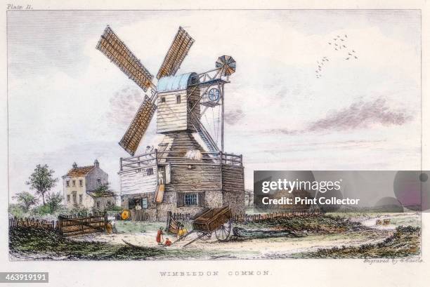 Post mill, Wimbledon Common, near London, c1840. This mill has a fantail and a gallery giving access to the sails and external mechanism.