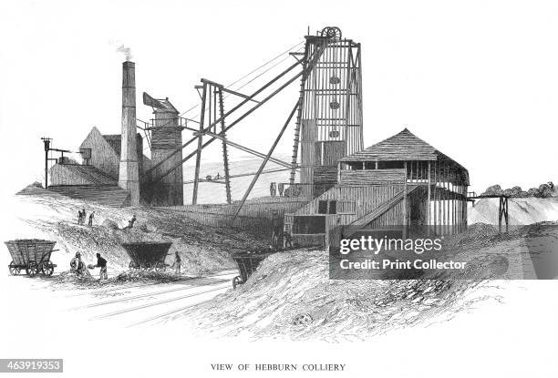 Pithead at Hebburn Colliery, Newcastle-upon-Tyne area, 1860. The engine house provides power for the winding gear which is raising baskets of coal...