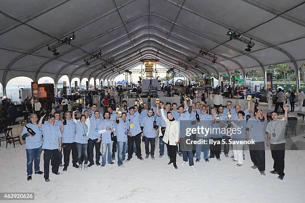 Debi Mazar and Gabriele Corcos pose with chefs at Ronzoni Pasta's 100th Anniversary: Al Fresco Feast sponsored by MIAMI Magazine hosted by Debi Mazar...