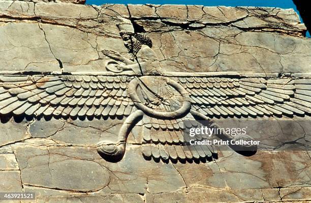 Ahura Mazda . Winged symbol of Ahura Mazda , Lord of Wisdom, supreme god of the Zorastrian religion of Persia. This relief is from the Royal Audience...