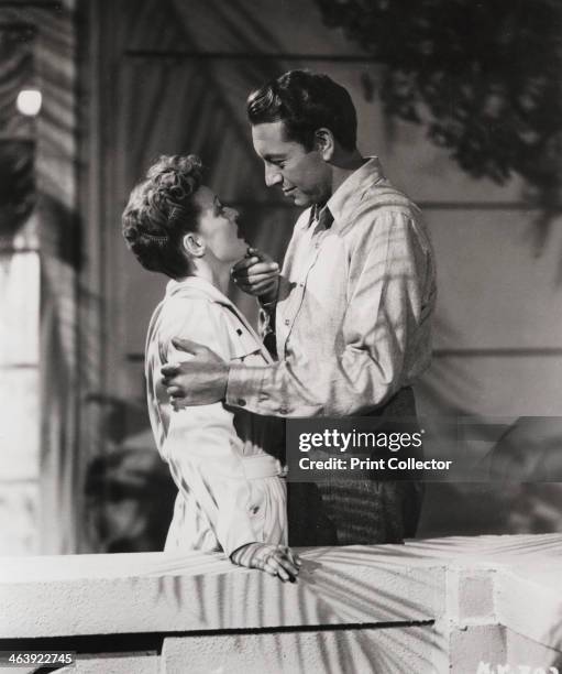 Scene from 'Now, Voyager', Warner Brothers, 1942. Still of the stars of the film, Bette Davis and Paul Henreid. Producer: Hal B Rogers. Director:...