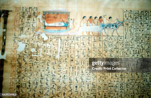 Papyrus from an Ancient Egyptian Book of the Dead. The scene shows a pharaoh on an ox-drawn bier being taken for burial.