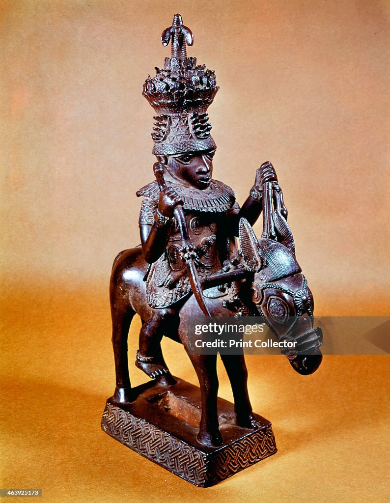 Benin bronze of horse and rider, West African.