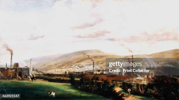 Industrial landscape, Wales, 19th century. An ironworks, clearly showing blast furnaces with flames spouting from their tops. The foreground shows...