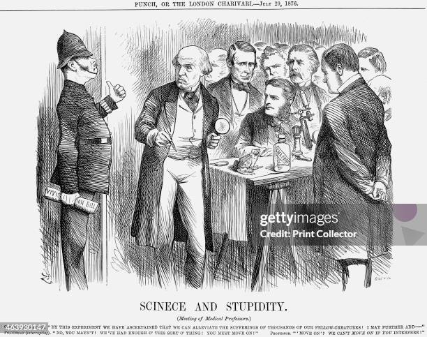 'Scinece and Stupidity', 1876. The policeman, clutching his Vivisection Bill, tries to move on the group of medical professors using a microscope to...