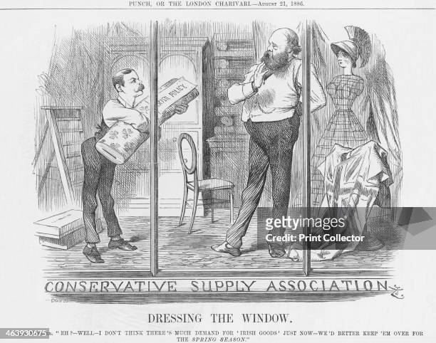 'Dressing the Window', 1886. The new Conservative Prime Minister, Lord Salisbury, decides upon the new shop window. He is being shown a bolt of Irish...