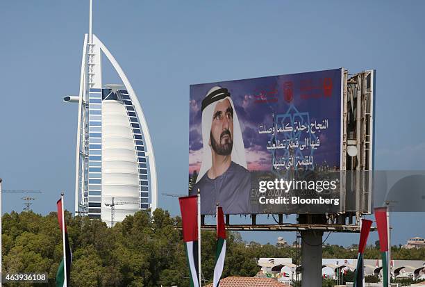 Billboard showing Sheikh Mohammed bin Rashid Al Maktoum, Dubai's ruler, advertises the World Expo 2020 exhibition near the Burj Al Arab hotel,...