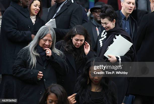 John Rocha, Simone Rocha and Odette Rocha depart a memorial service for Professor Louise Wilson during London Fashion Week Fall/Winter 2015/16 at St...